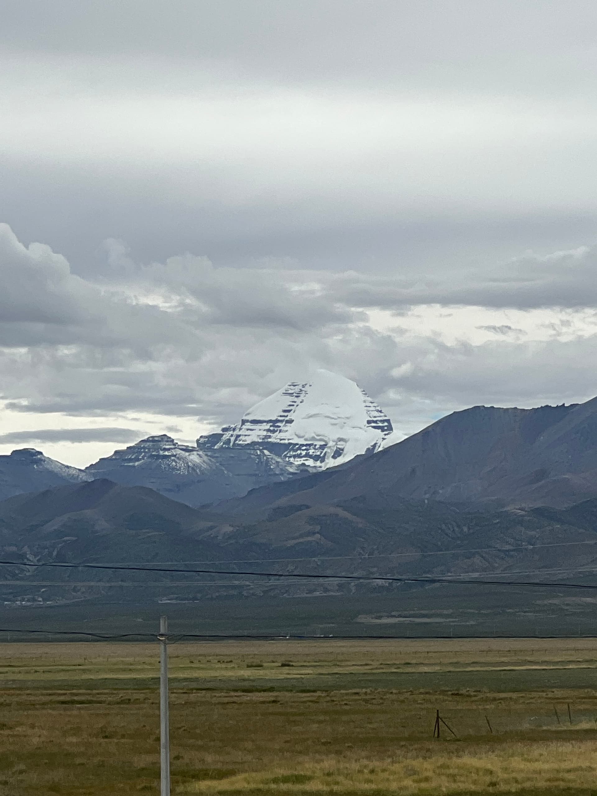 Mount Kailash south face from Ashtapad with Nandi Parvat in front, under a wide Himalayan sky