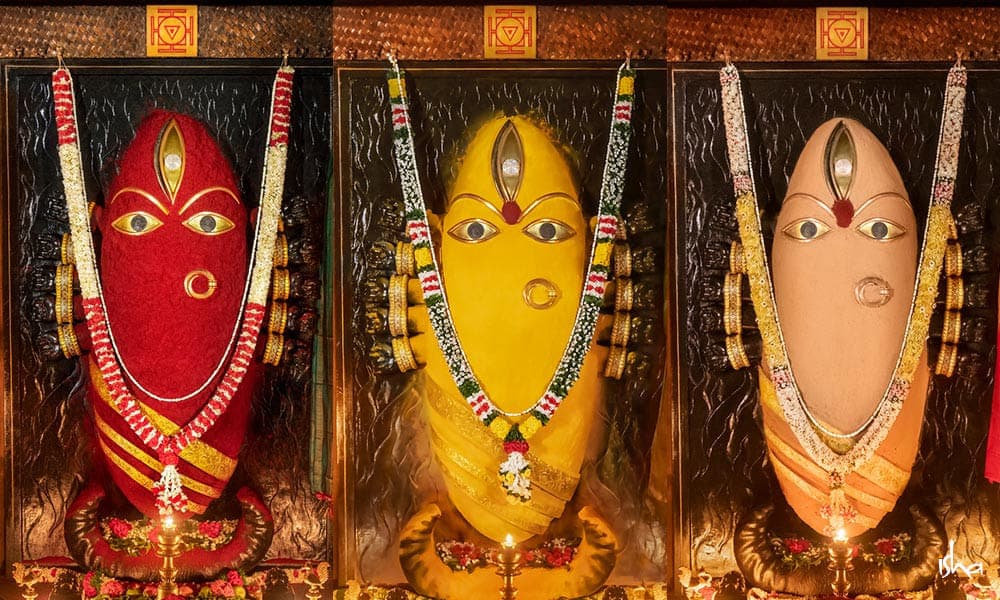 Linga Bhairavi adorned in red, yellow and cream for the three phases of Navratri