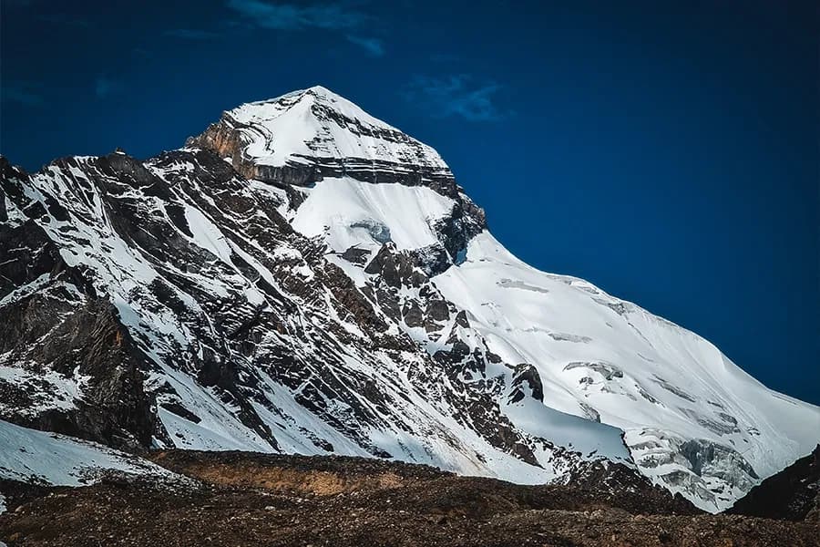 Adi Kailash massif with snow and rock faces under clear Himalayan sky