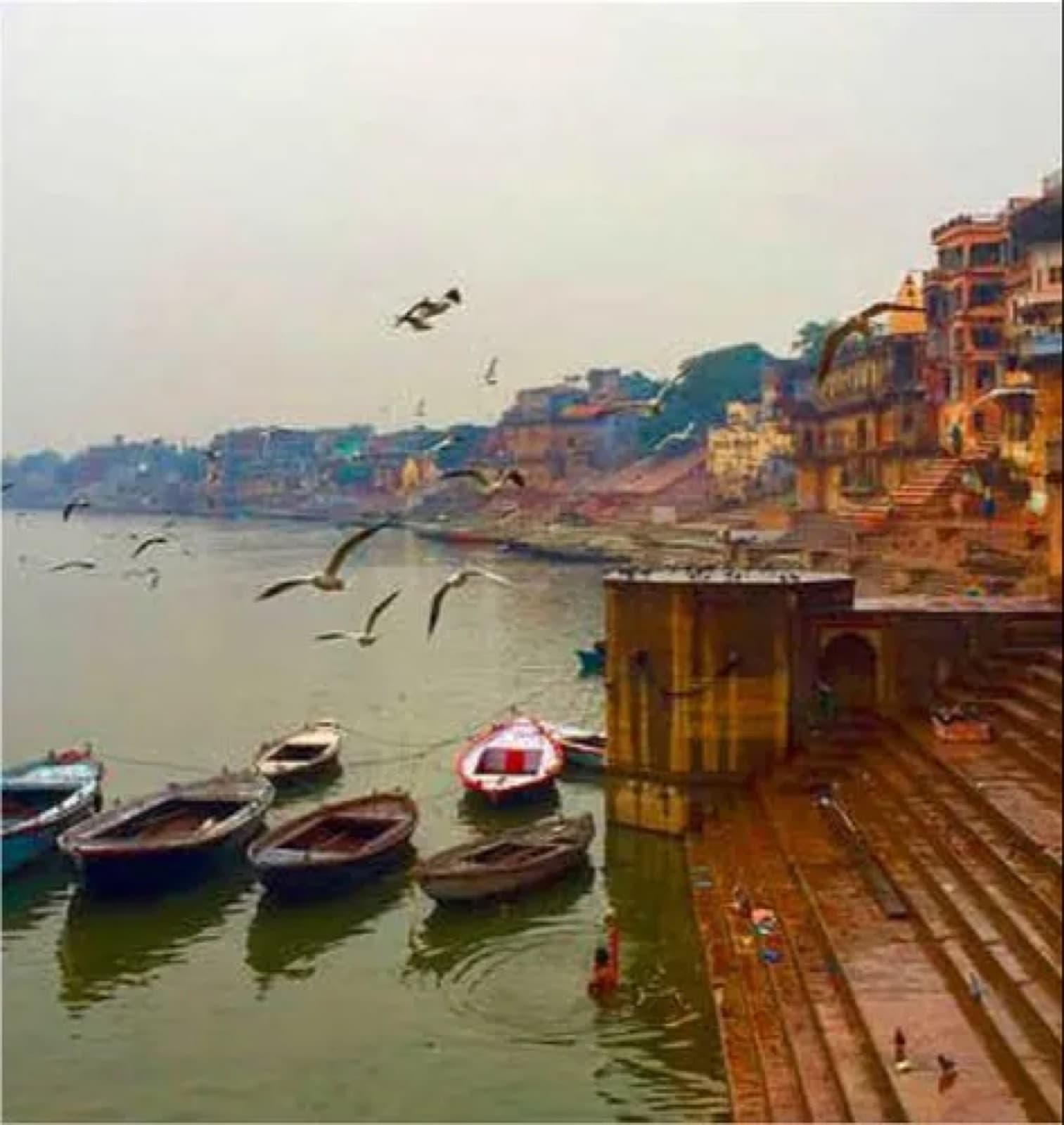 Boats along the ghats of Varanasi on the Ganga at dawn.
