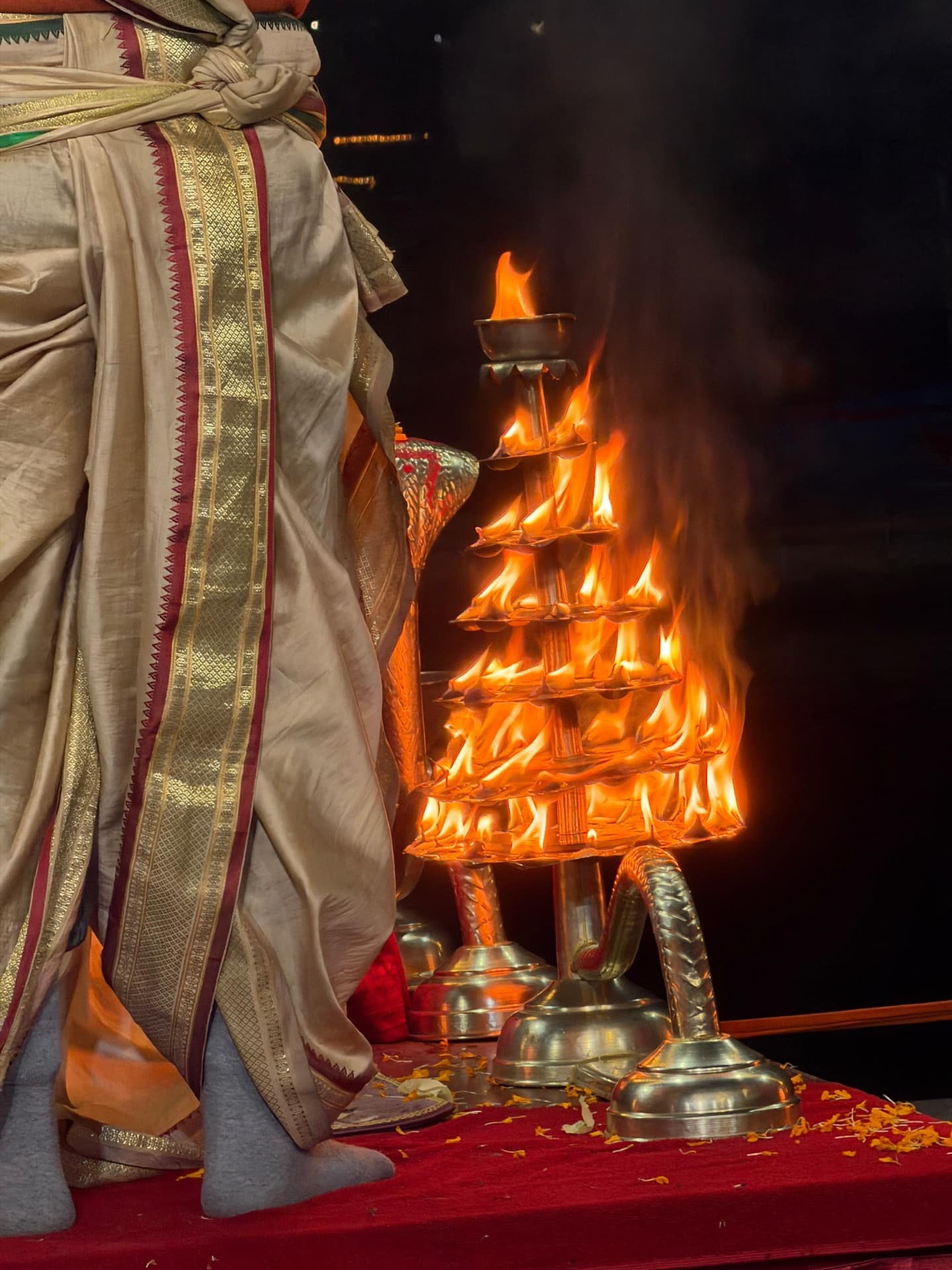 Sacred Nepal yatra — prayer wheels along a pilgrimage path